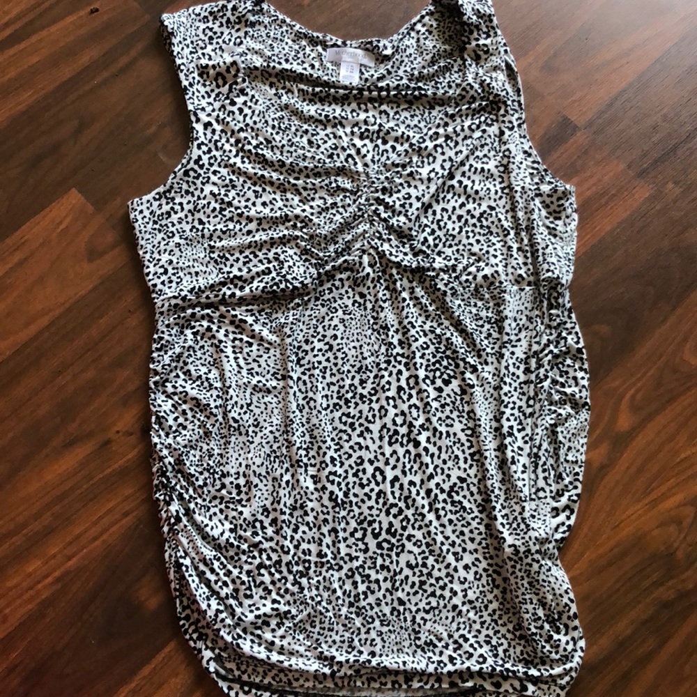 Maternity sleeveless shirt.